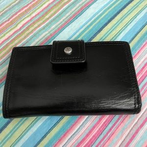 Hobo brand wallet, black , missing one snap, good used condition, soft leather